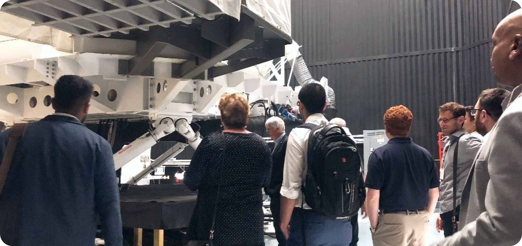 A group of people touring the hospital simulators in the Winter Lab at Toronto Rehabilitation Institute