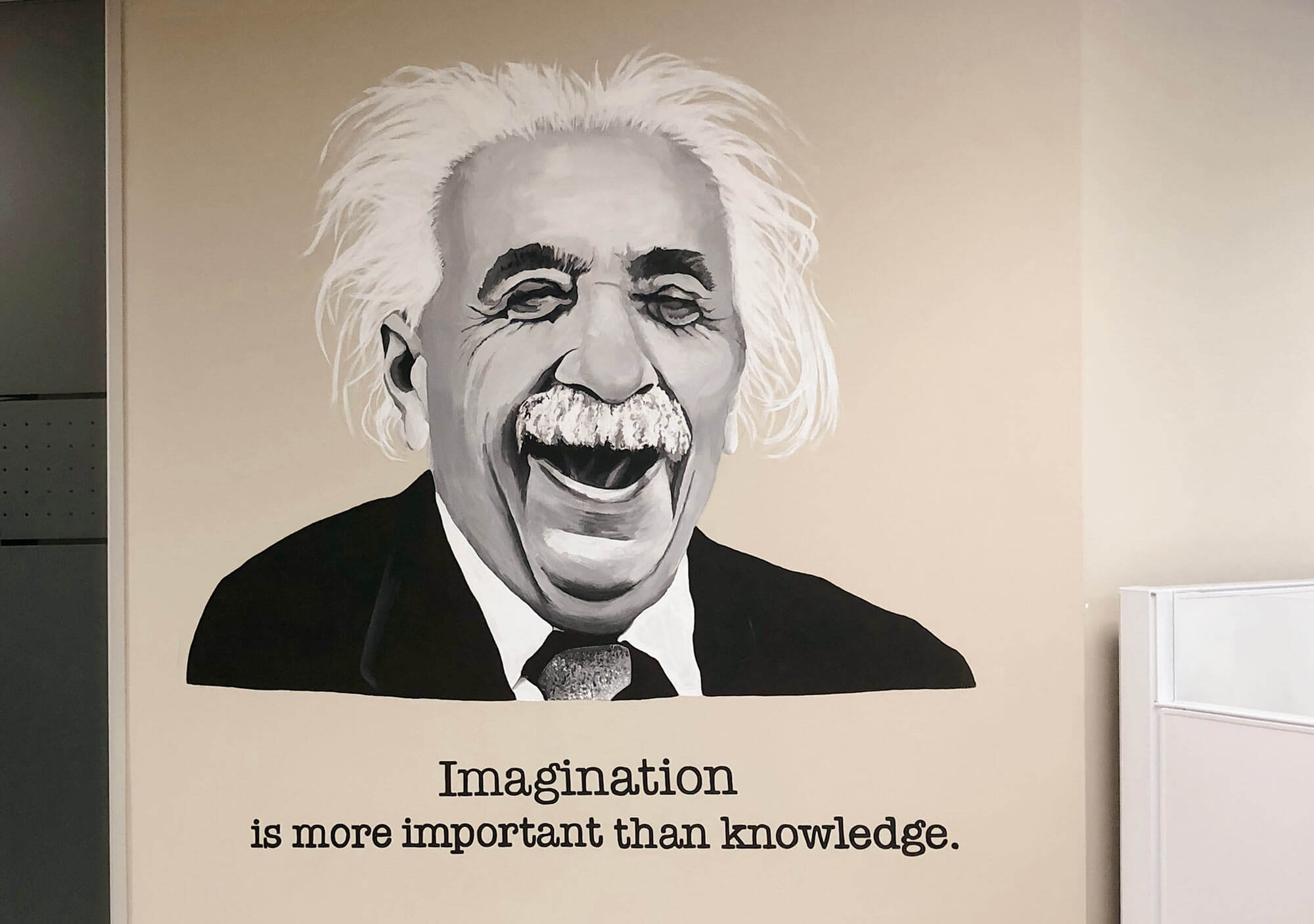 Painting of Albert Einstein laughing with his quote