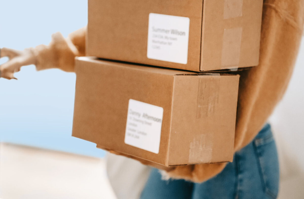 Woman carrying parcels.